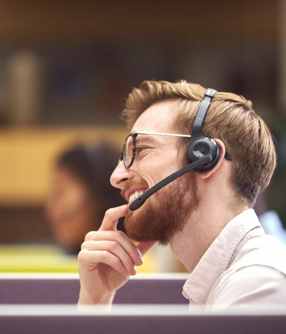 businessman in cubicle wearing headset talking to 2021 12 09 06 51 04 utc min
