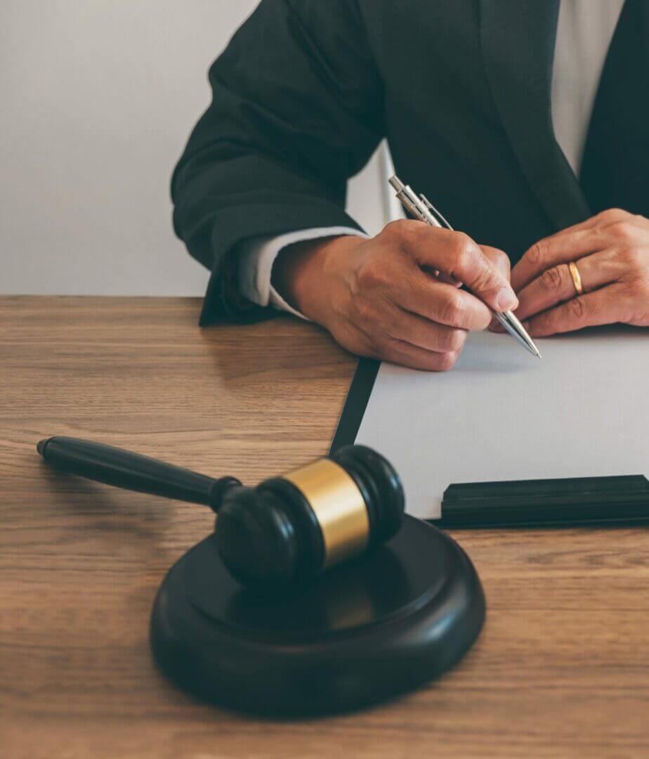 male lawyer working on a document 2022 11 17 14 43 22 utc (1)