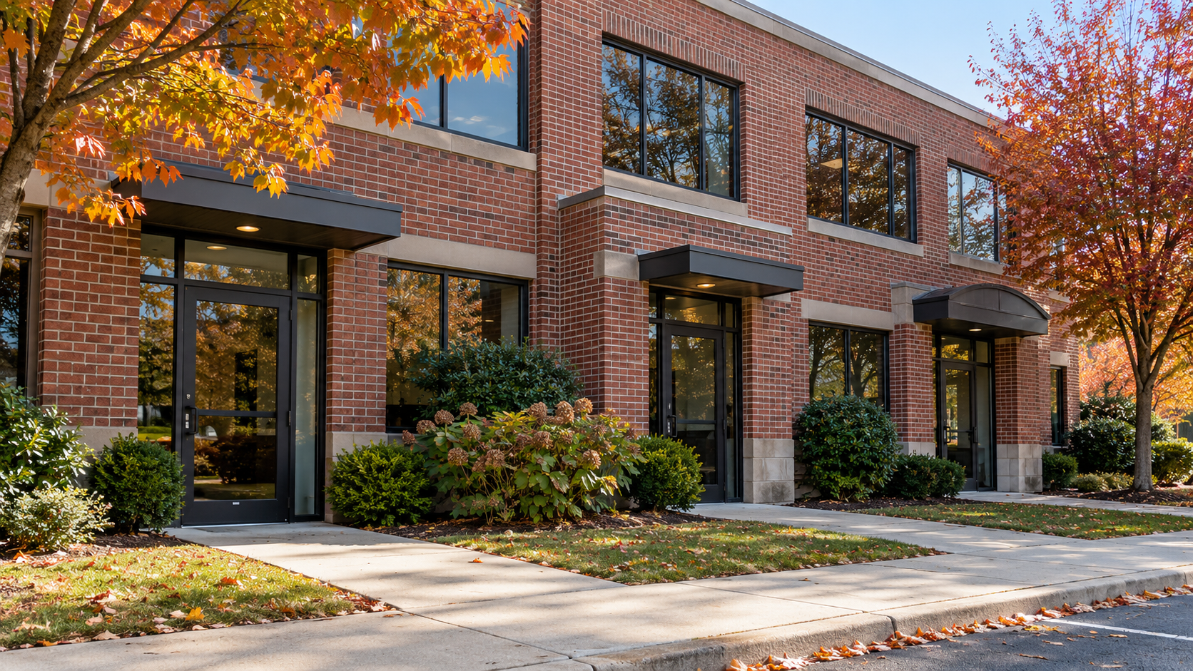 Separate entrances to a brick office building in northern New Jersey
